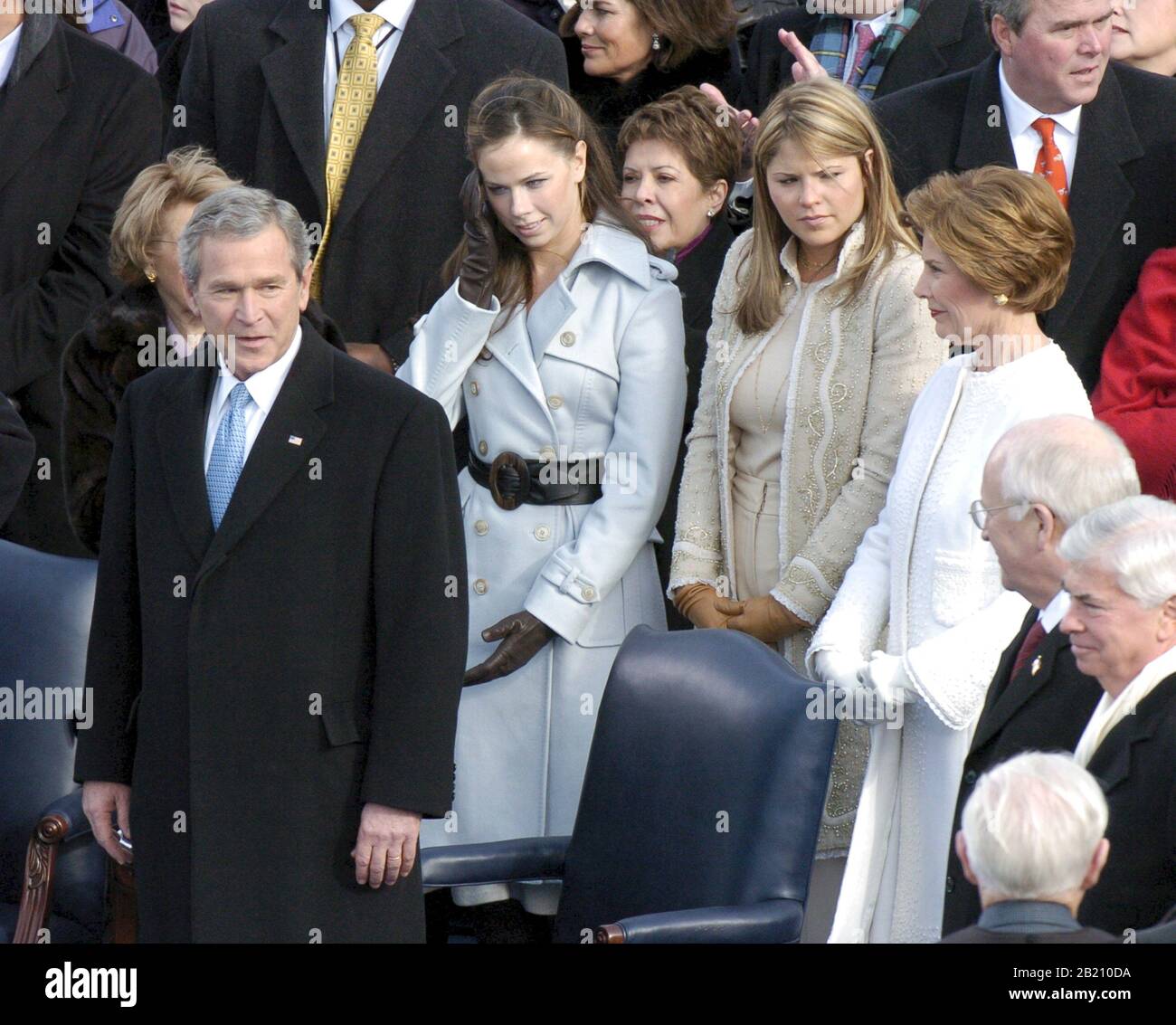 Washington, D.C. 20JAN05: Capitol ceremony for the swearing in of President George W. Bush for his second term (left-rigtht, Pres. Bush, daughters Barbara Bush and Jenna Bush, and First Lady Laura Bush)..  ©Bob Daemmrich Stock Photo