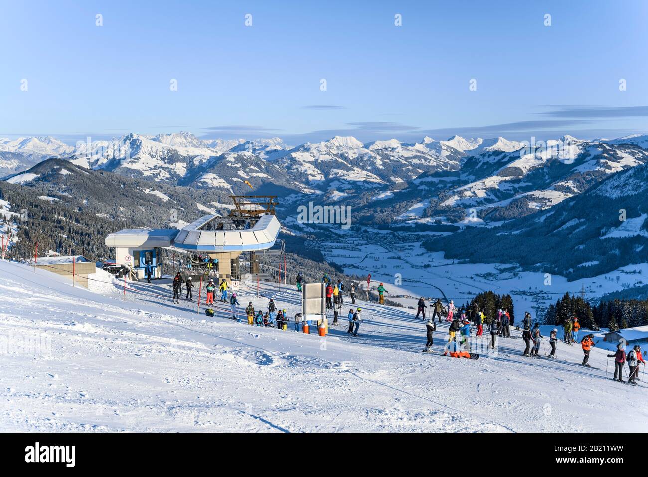 Skier at the Kaelbersalven lift, chairlift in the SkiWelt Wilder ...