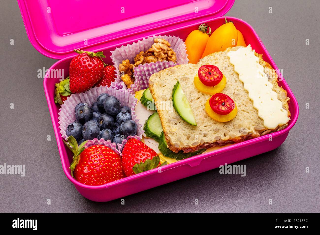 School lunch box with sandwich, fresh fruits, vegetables and nuts. Healthy  eating habits for kids. Back to school concept. Black stone concrete backgr  Stock Photo - Alamy