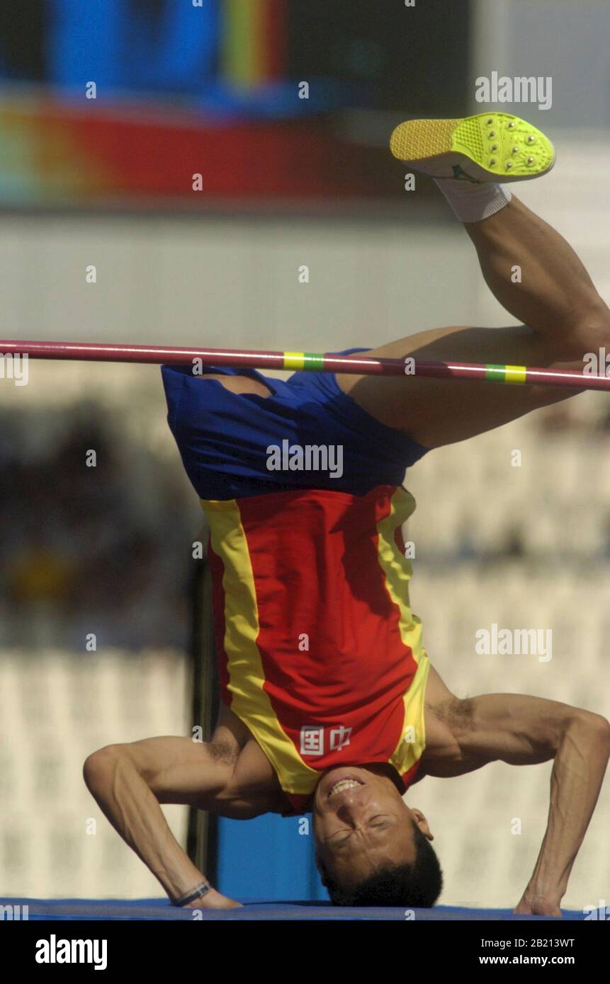 Athens, Greece: China's Bin Hou clears the high jump in the F42 class to win in 1.77 meters. September 23, 2004 ©Bob Daemmrich Stock Photo