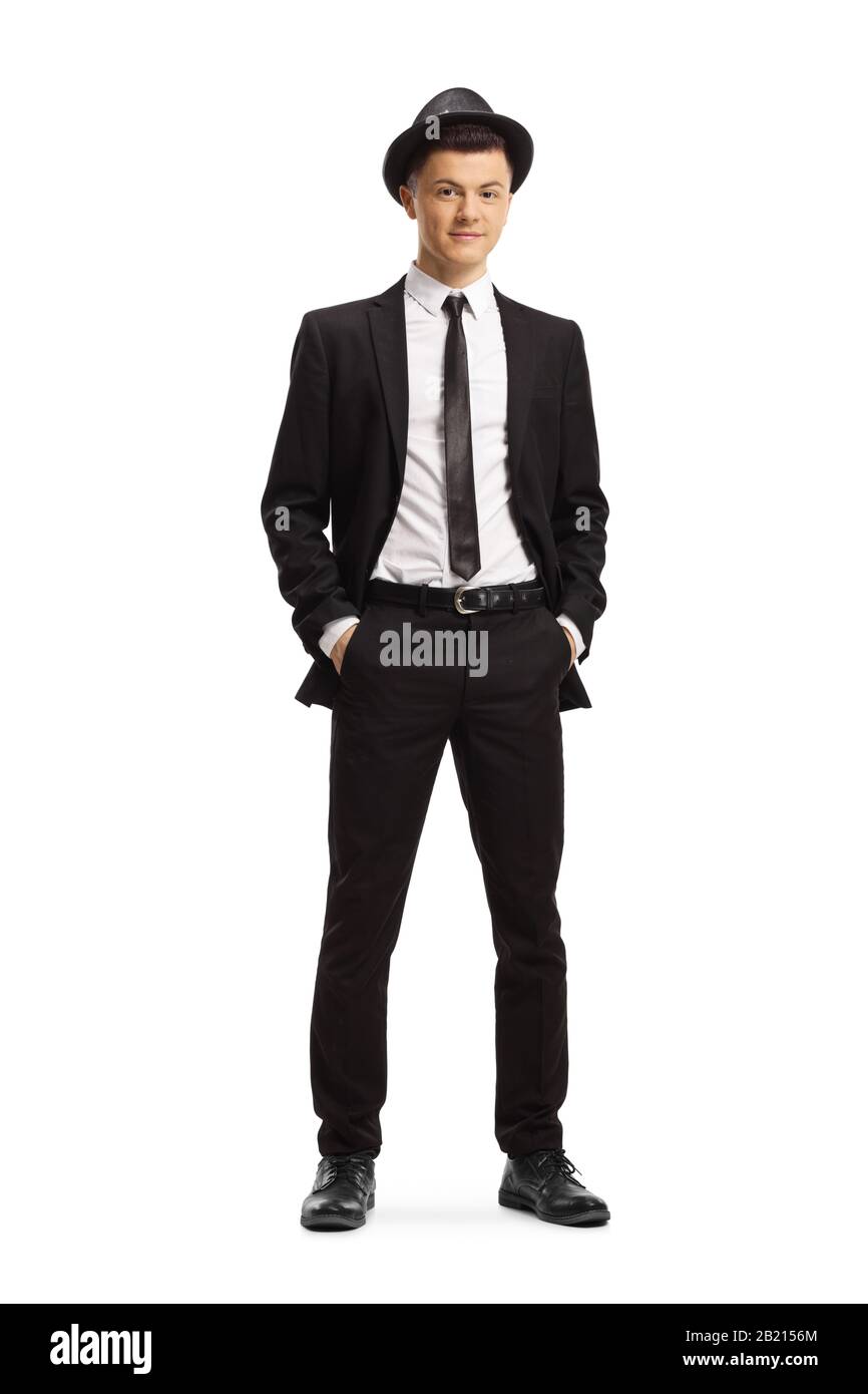 Full length portrait of a young guy in a suit and fedora hat isolated ...