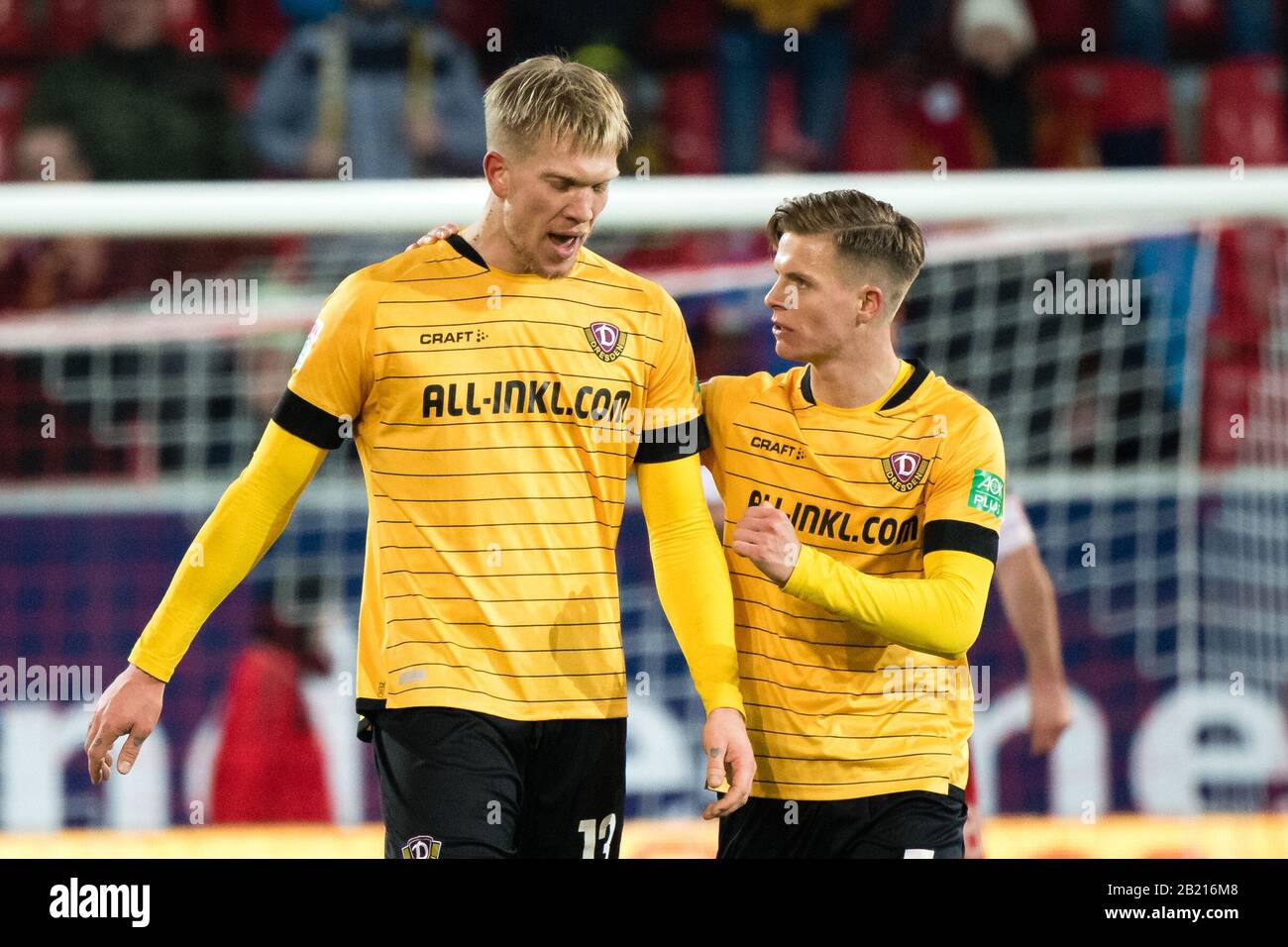 Regensburg, Germany. 28th Feb, 2020. Football: 2nd Bundesliga, Jahn Regensburg - Dynamo Dresden, 24th matchday in the Continental Arena. Goalscorer Simon Makienok Christoffersen from Dynamo Dresden (l) cheers with Dzenis Burnic about his goal for 1:2. Credit: Matthias Balk/dpa - IMPORTANT NOTE: In accordance with the regulations of the DFL Deutsche Fußball Liga and the DFB Deutscher Fußball-Bund, it is prohibited to exploit or have exploited in the stadium and/or from the game taken photographs in the form of sequence images and/or video-like photo series./dpa/Alamy Live News Stock Photo
