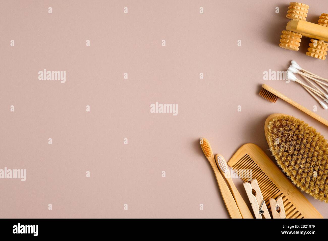 Ecofriendly hygiene products bathroom accessories on brown background. Top view bamboo