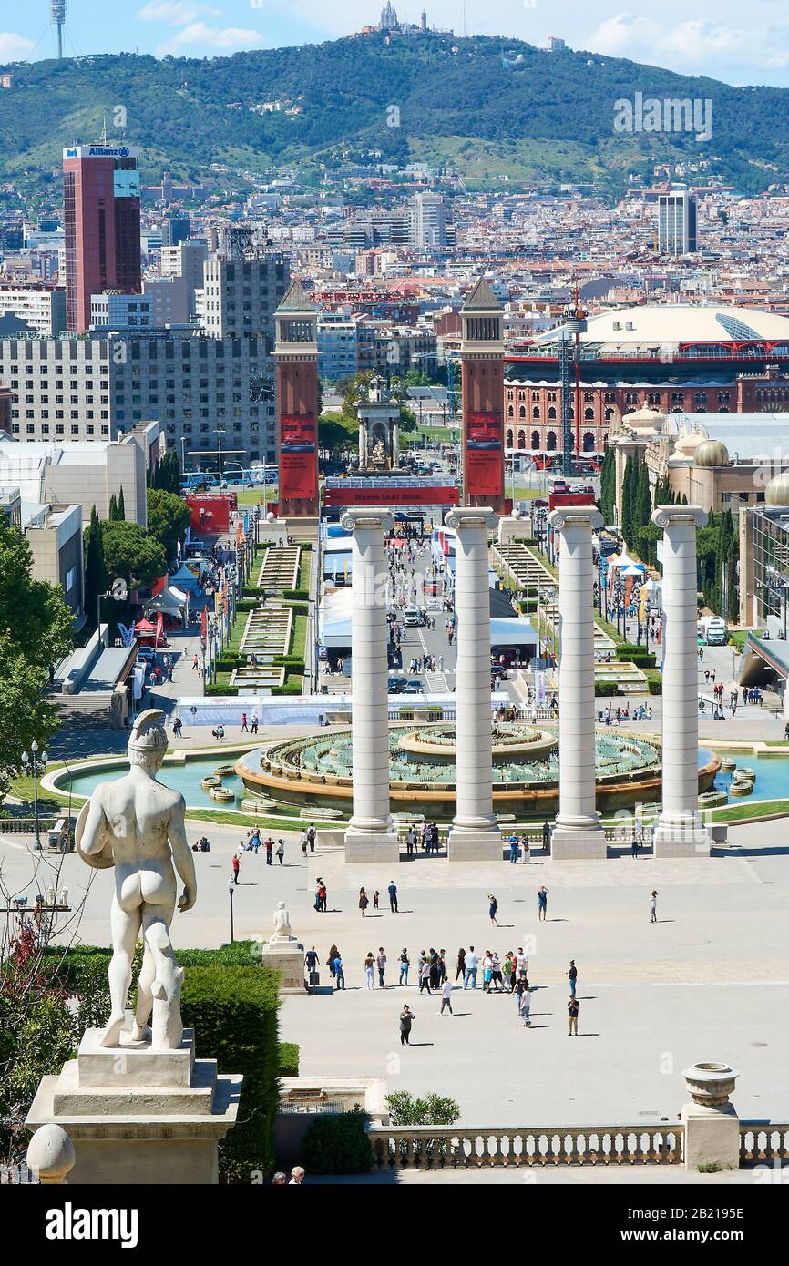 BARCELONA, SPAIN - MAY 13, 2017: Vertical shot. View from Montjuic hill with the Four Columns, the Magic Fountain, the Venetian Towers, Plaza Espana, Stock Photo