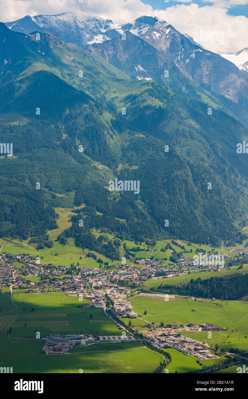 Aerial view of the town of Kaprun in Austria. City surrounded by Tirol Alps mountains. View from above. Stock Photo