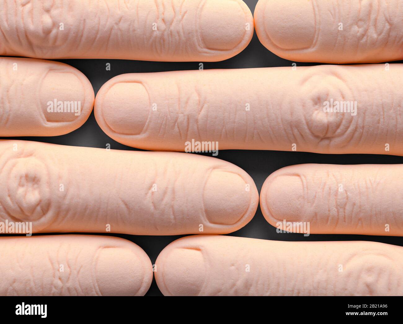 Several Index Fingers Close Up on Black Background. Stock Photo