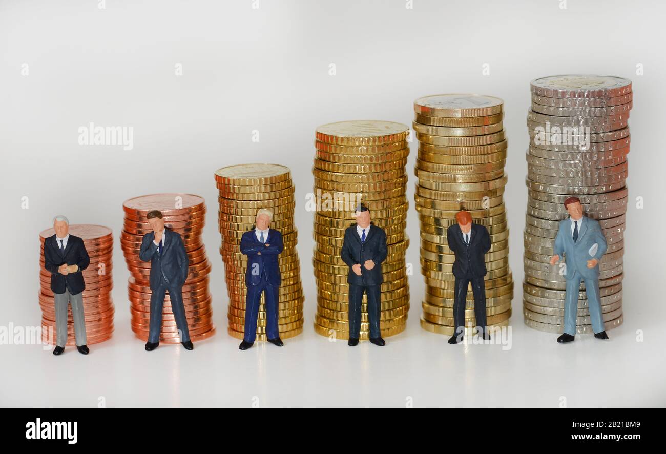 Centmuenzen, Euromuenzen, Miniaturfiguren, Manager Stock Photo