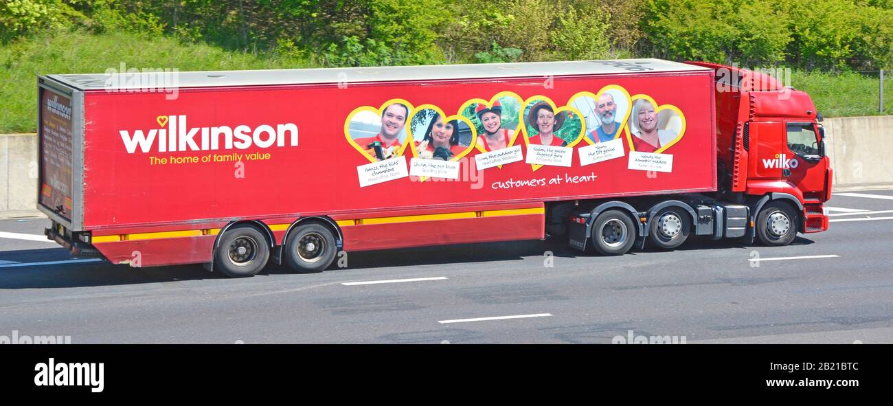 Supply chain lorry truck & Wilkinson trailer with company advertising on side of trailer during business  rebranding to trade as Wilko on UK motorway Stock Photo