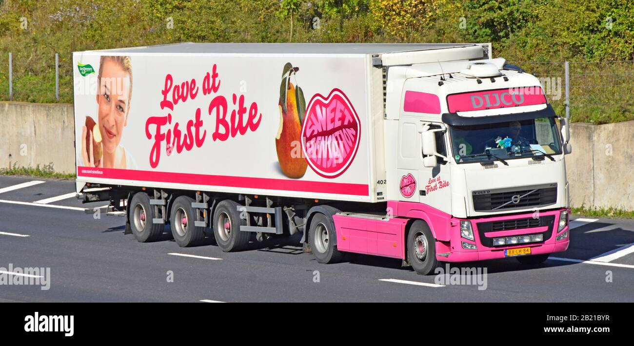 Dutch Dijco transport business hgv lorry truck towing Greenery company food supply chain trailer with advertising for fruit products on UK motorway Stock Photo