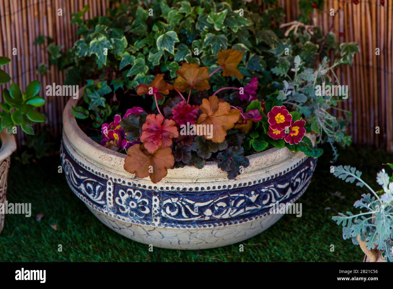 ancient Greek vases are used as pots for decorative flowers Stock Photo -  Alamy