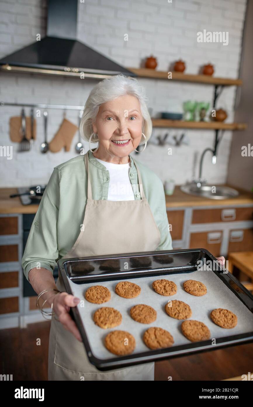 Old woman baking cookies hires stock photography and images Alamy