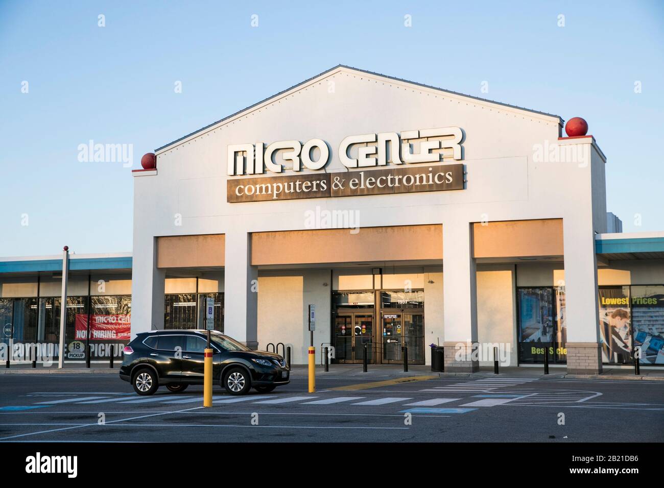A logo sign outside of a Micro Center retail store location in Baltimore, Maryland on February 22, 2020. Stock Photo