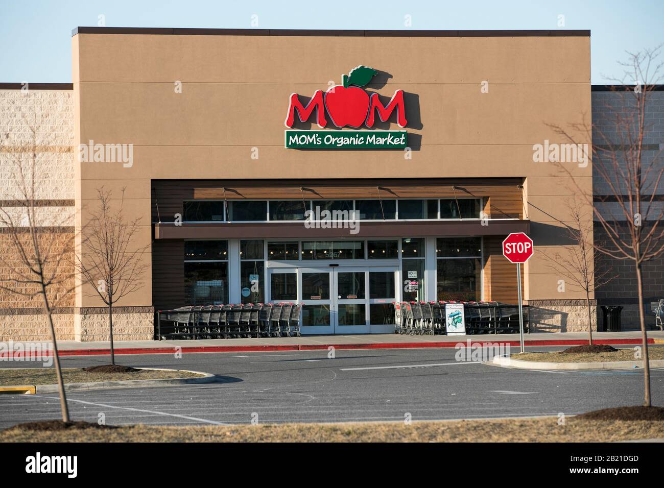 A logo sign outside of a MOM's Organic Market retail grocery store location in Nottingham, Maryland on February 22, 2020. Stock Photo