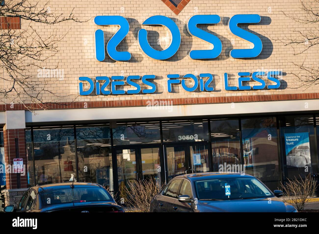 A logo sign outside of a Ross retail store location in Waldorf