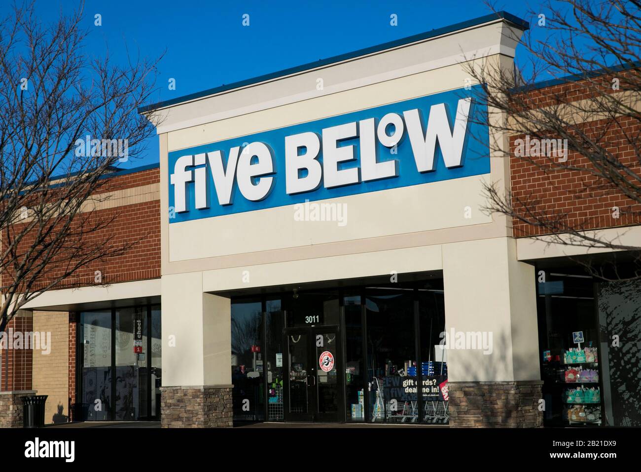 A logo sign outside of a Five Below retail store location in Waldorf, Maryland, on February 27, 2020. Stock Photo