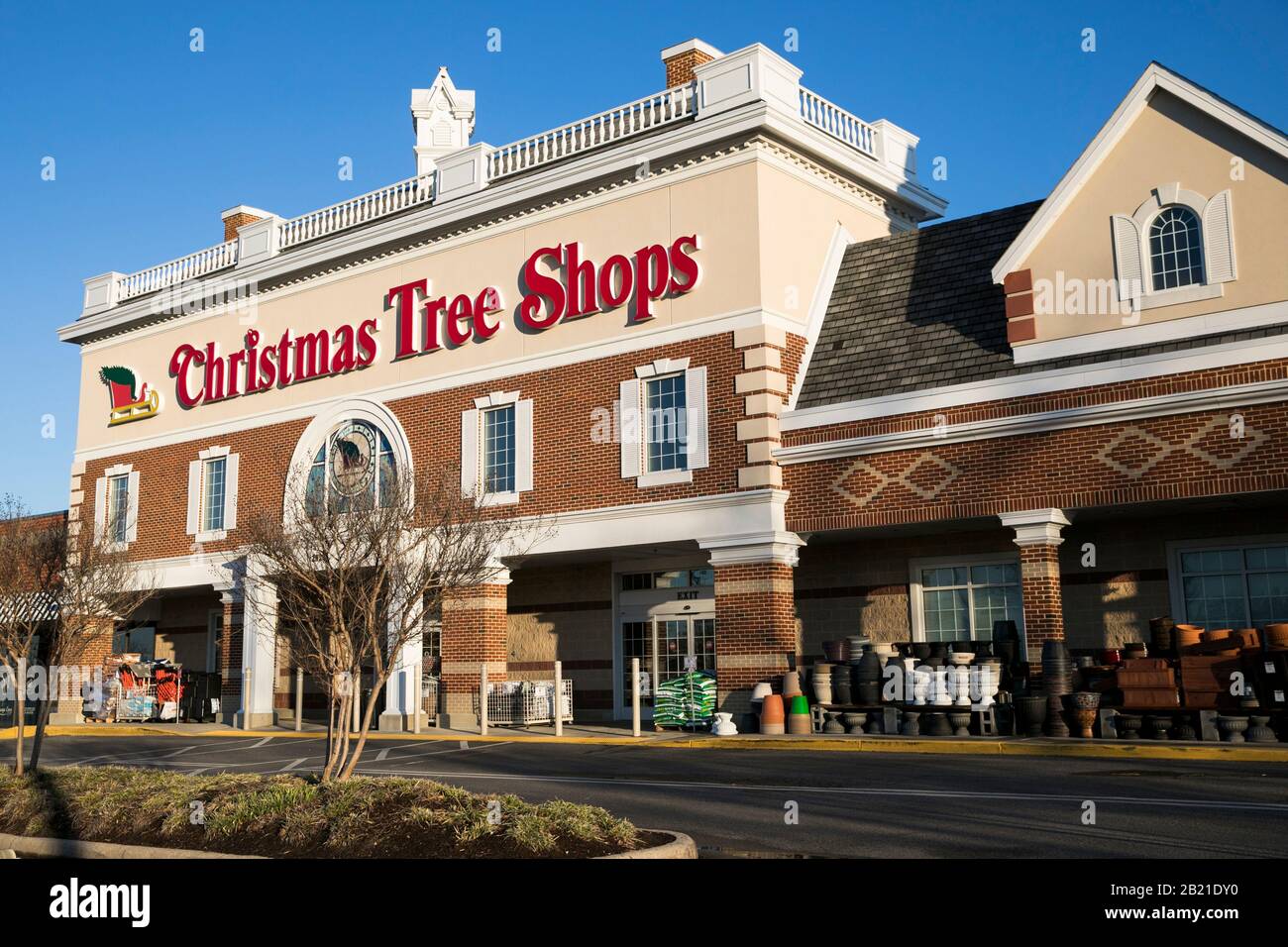 A logo sign outside of a Christmas Tree Shops retail store location in