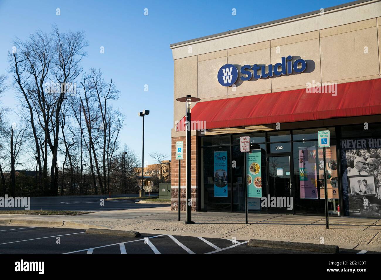 A logo sign outside of a Weight Watchers Studio location in Waldorf