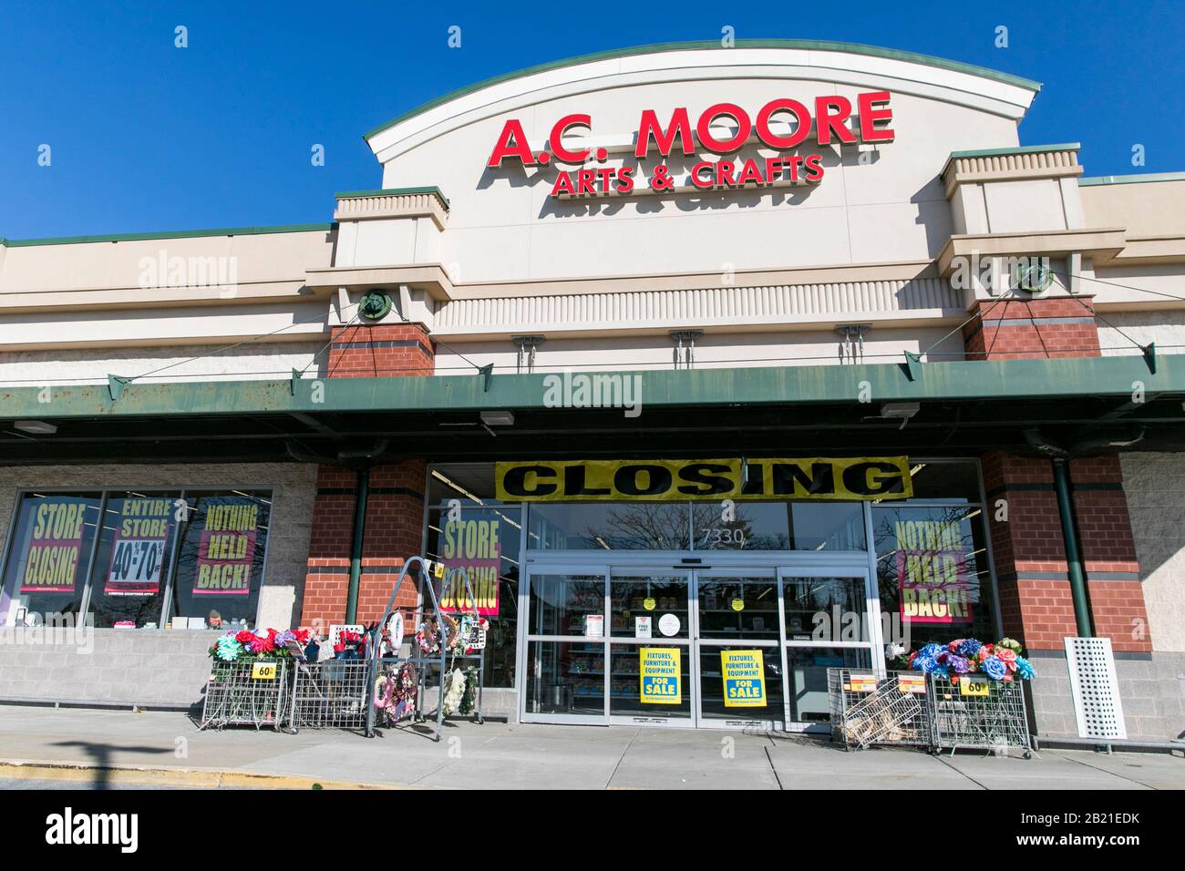 'Store Closing' signage outside of a A.C. Moore retail store location