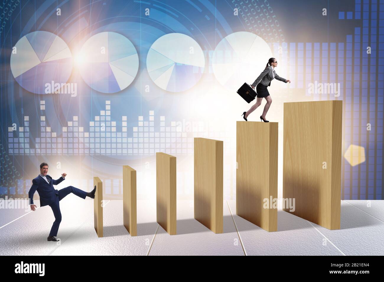 Domino effect and the competition concept Stock Photo - Alamy