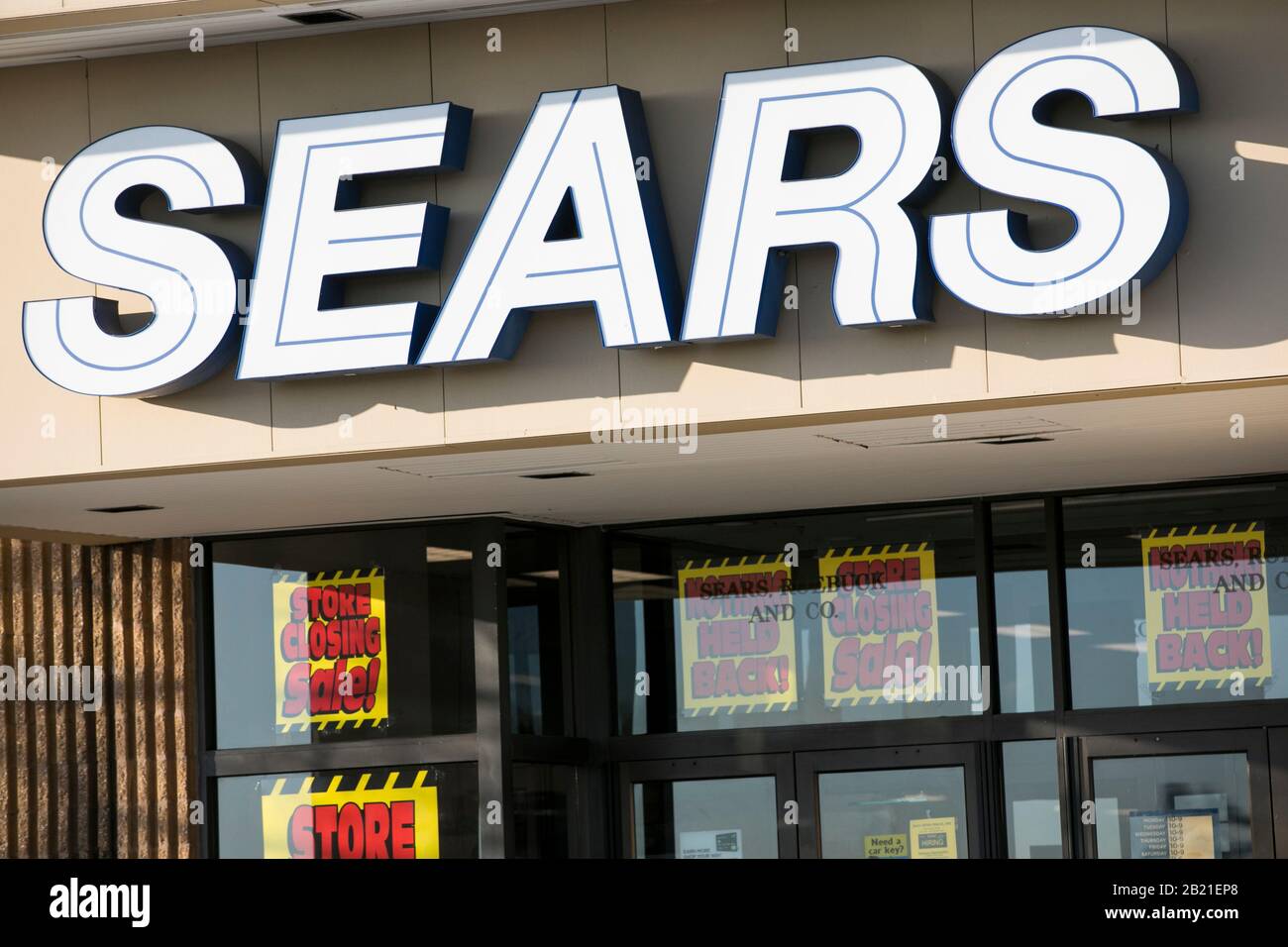 'Store Closing' signage outside of a Sears retail store location in