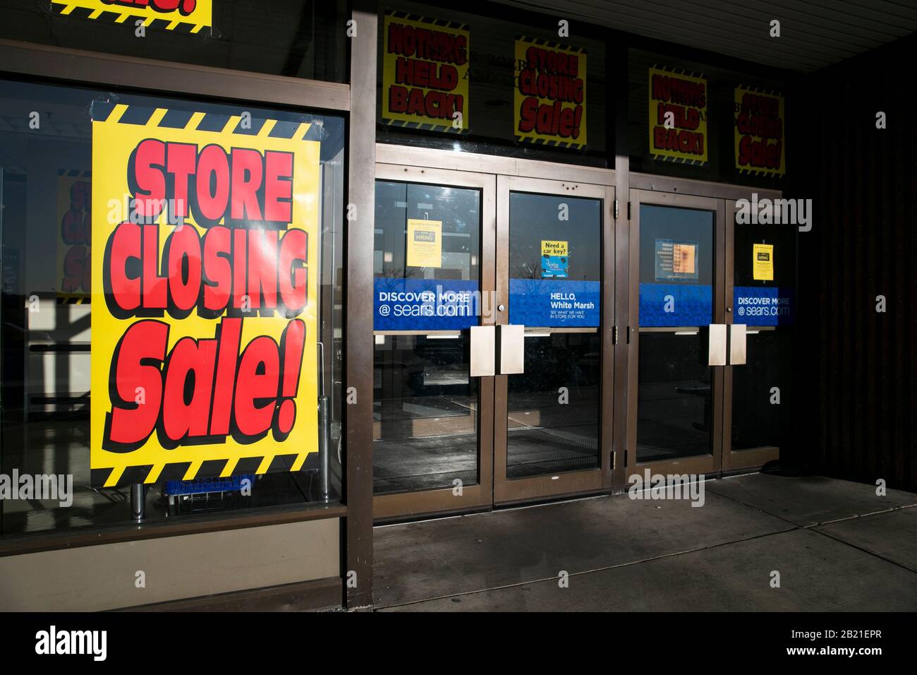 'Store Closing' signage outside of a Sears retail store location in