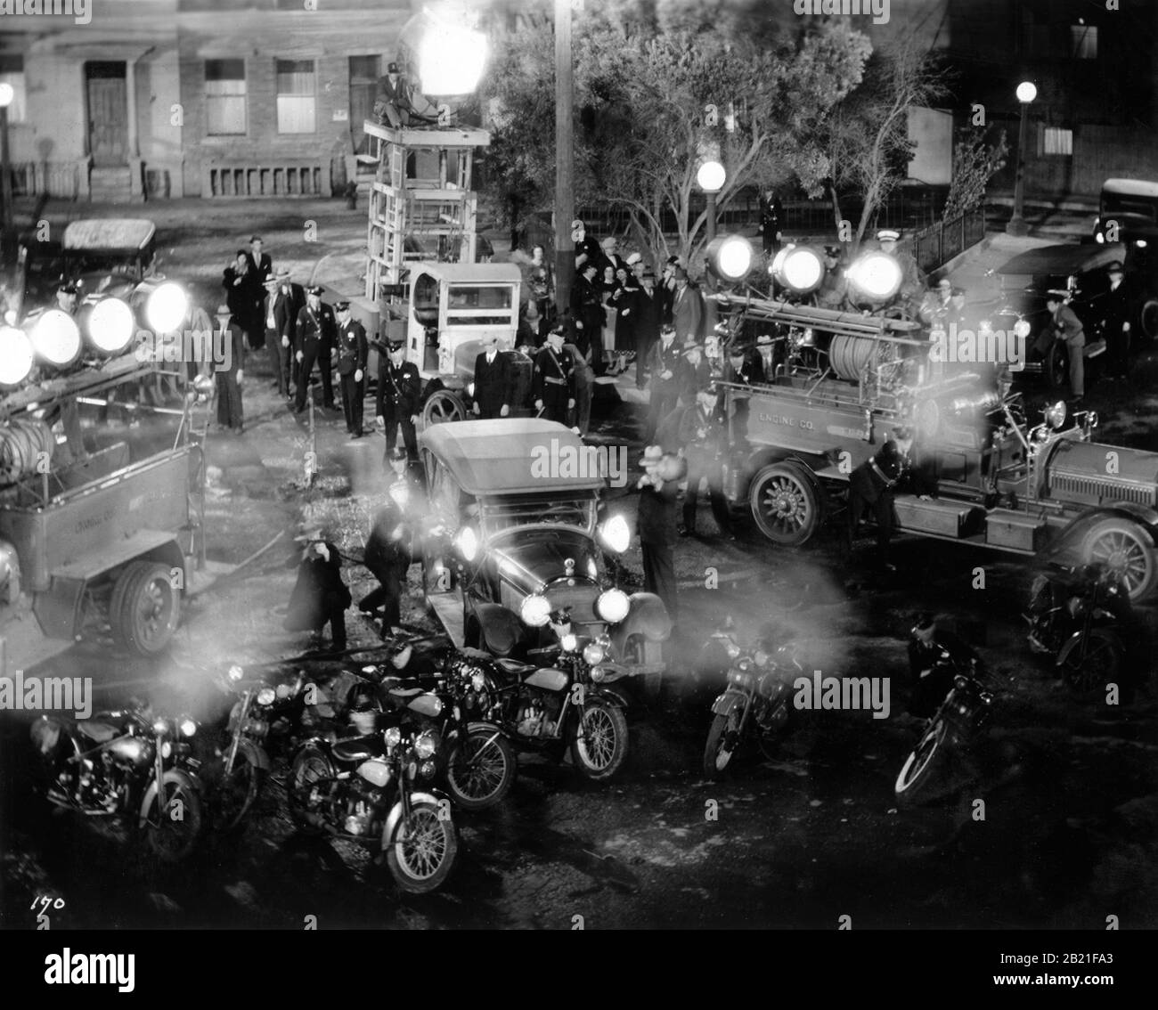 Policemen Cars and Searchlights in Final Battle in SCARFACE 1932 directors HOWARD HAWKS and RICHARD ROSSON novel Armitage Trail screen story Ben Hecht producer Howard Hughes The Caddo Company / United Artists Stock Photo