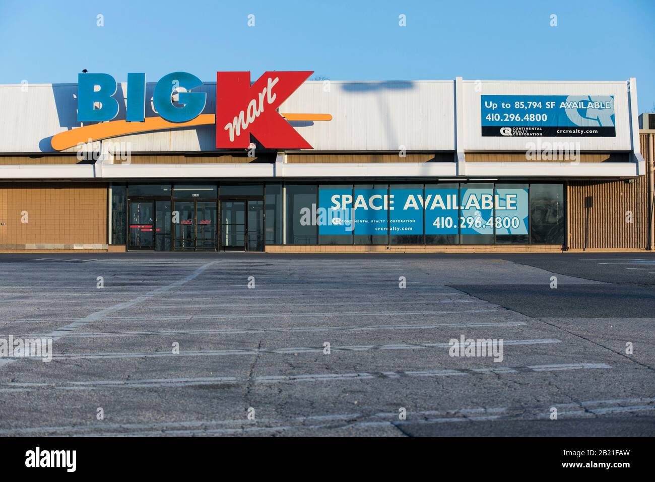 A 'Space Available" sign outside of a closed and abandoned Big Kmart