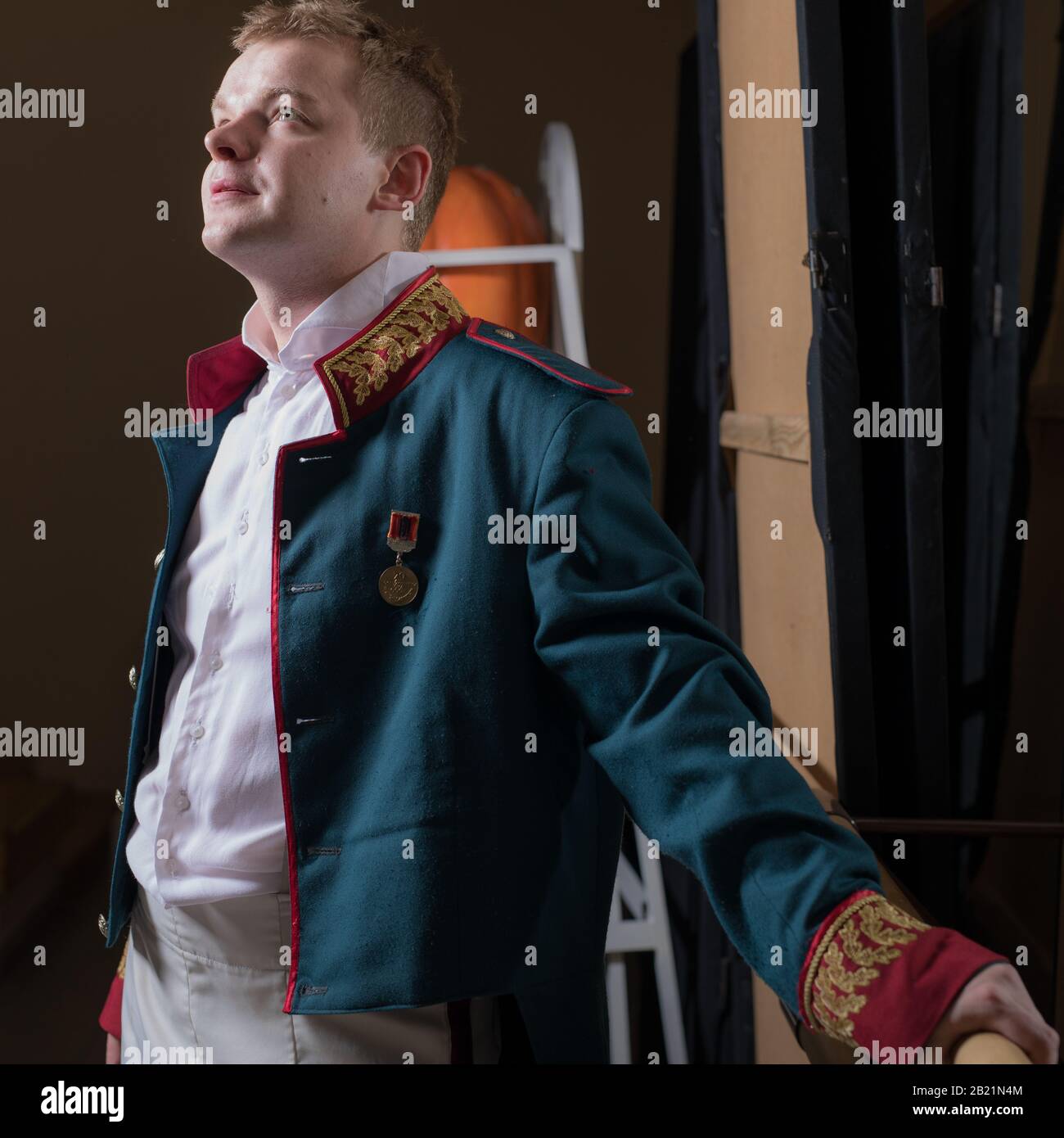 Actor dressed historical costume in interior of old theater Stock Photo ...