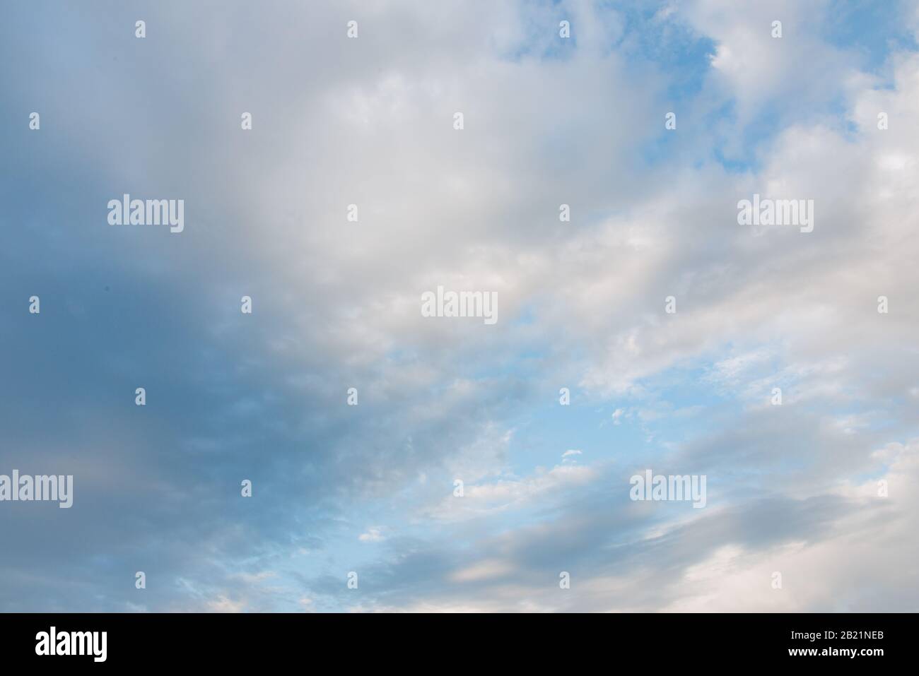 Background - White clouds are overtaken by soft gray rain clouds ...