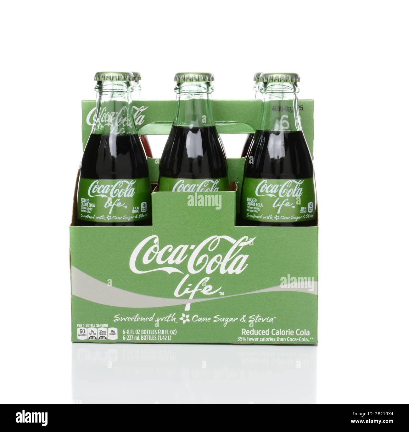 IRVINE, CA - FEBRUARY 15, 2015: 6 pack bottles of Coca-Cola Life side view. A reduced calorie soft drink sweetened with cane sugar and Stevia, contain Stock Photo
