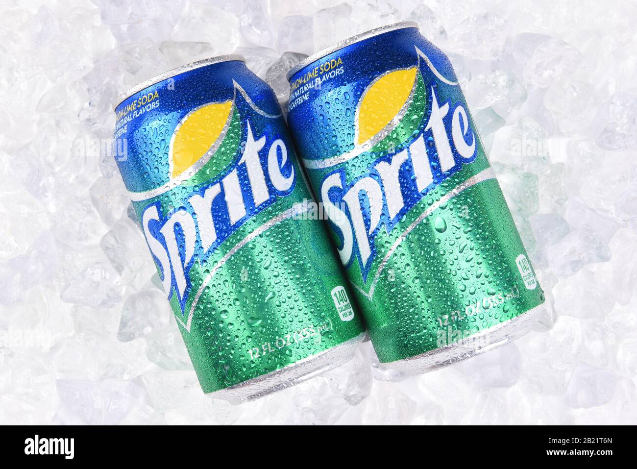 IRVINE, CALIFORNIA - JULY 10, 2017: Two Sprite Cans on a bed of ice with condensation. Sprite is a lemon lime soft drink from the Coca-Cola Comapny. Stock Photo