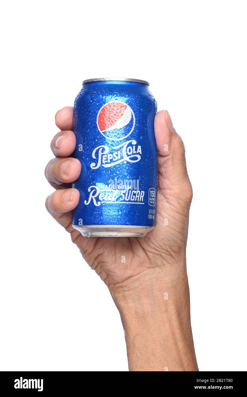 IRVINE, CALIFORNIA - APRIL 26, 2019: Closeup of a hand holding a cold can of Pepsi Cola, made with real sugar. Stock Photo