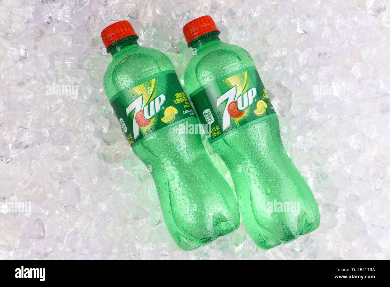 IRVINE, CALIFORNIA - AUGUST 19, 2019: Two plastic 7-up lemon-lime soda bottles in ice. Stock Photo
