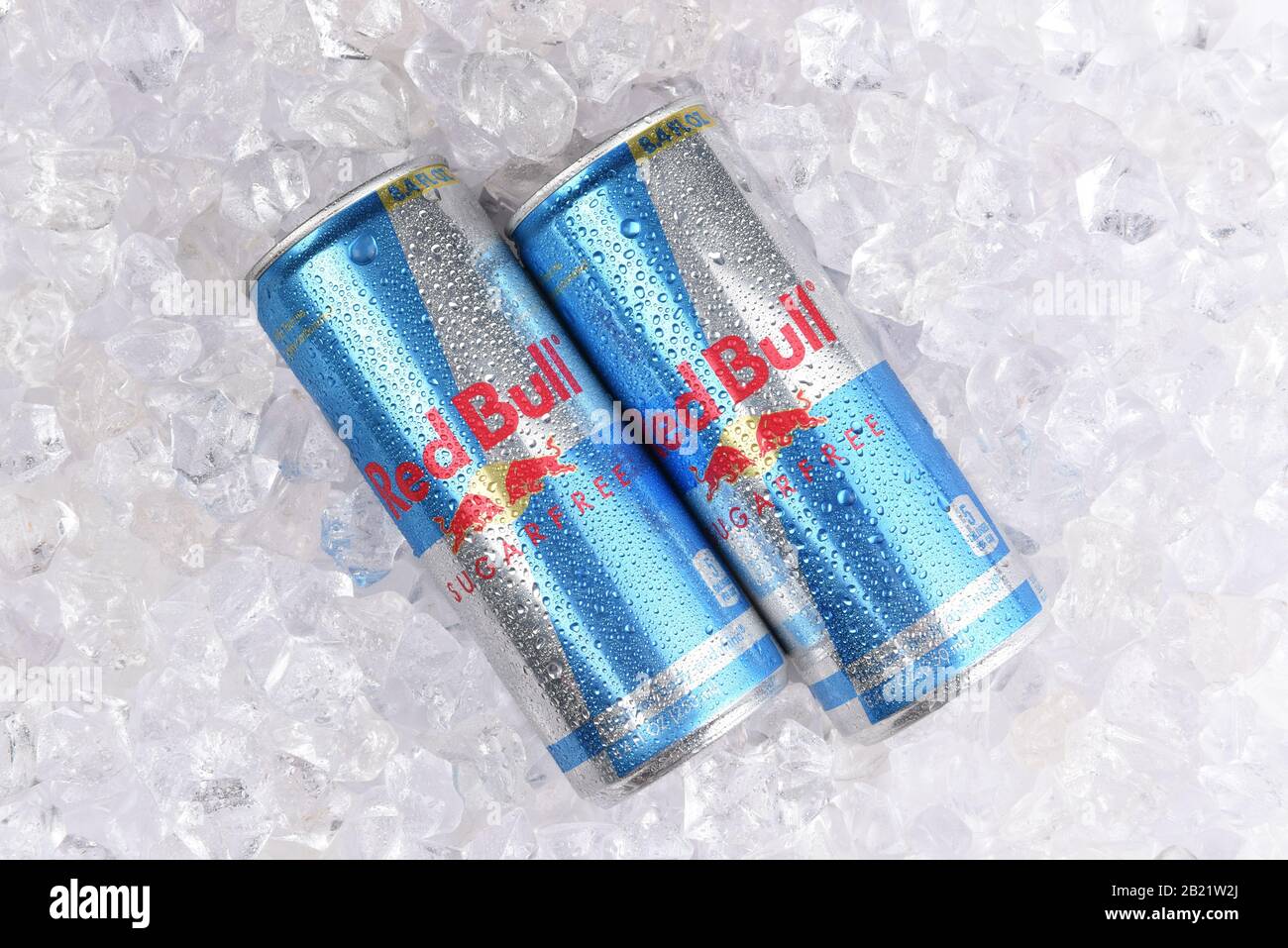 IRVINE, CALIFORNIA - AUGUST 19, 2019: Two Red Bull Sugar Free Energy Drink cans in ice. Stock Photo