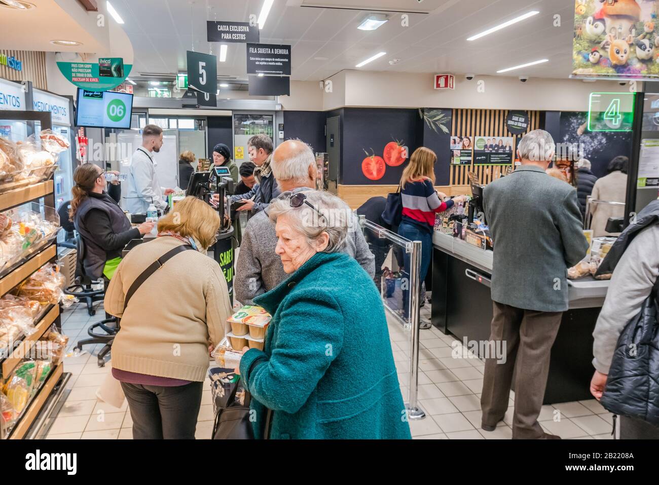 long lineup to the cashier inside a grocery store supermarket lisbon