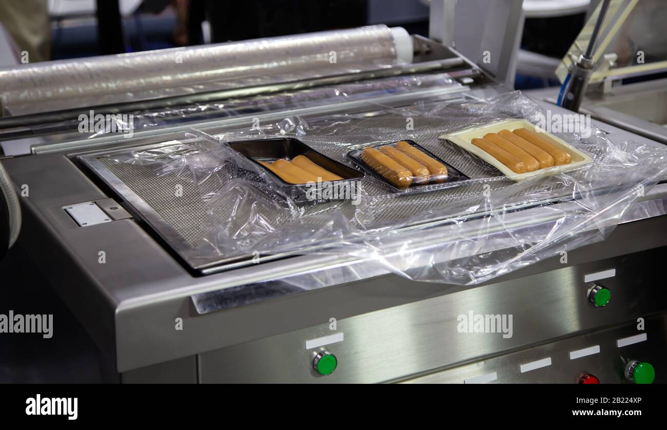 Heat sealing vacuum machine for food packaging Stock Photo Alamy