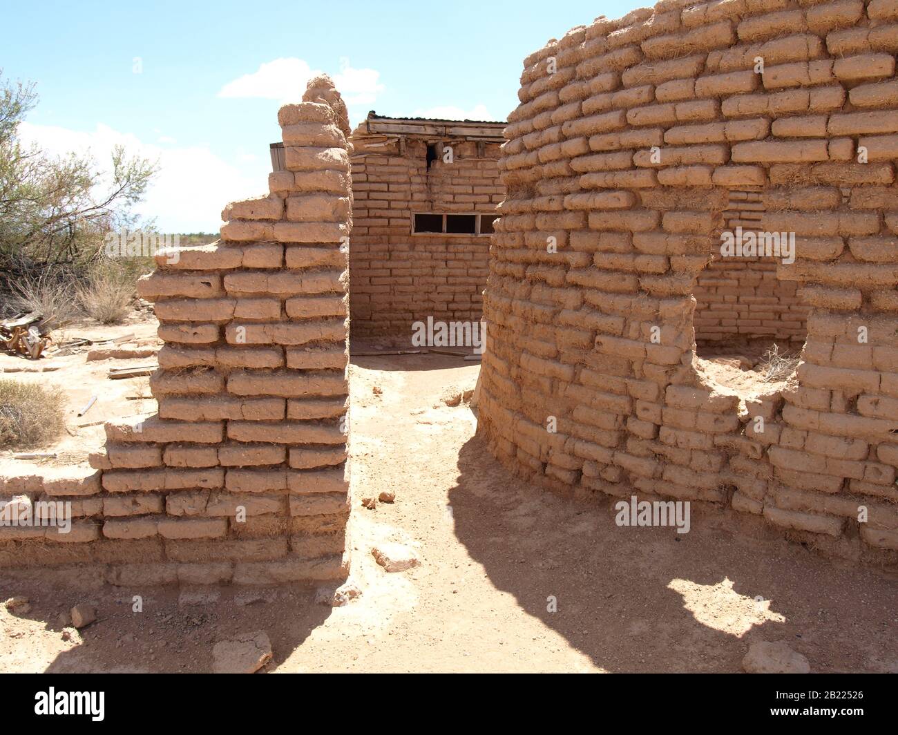 The ghostly remains of an old adobe brick home near Aztec Arizona