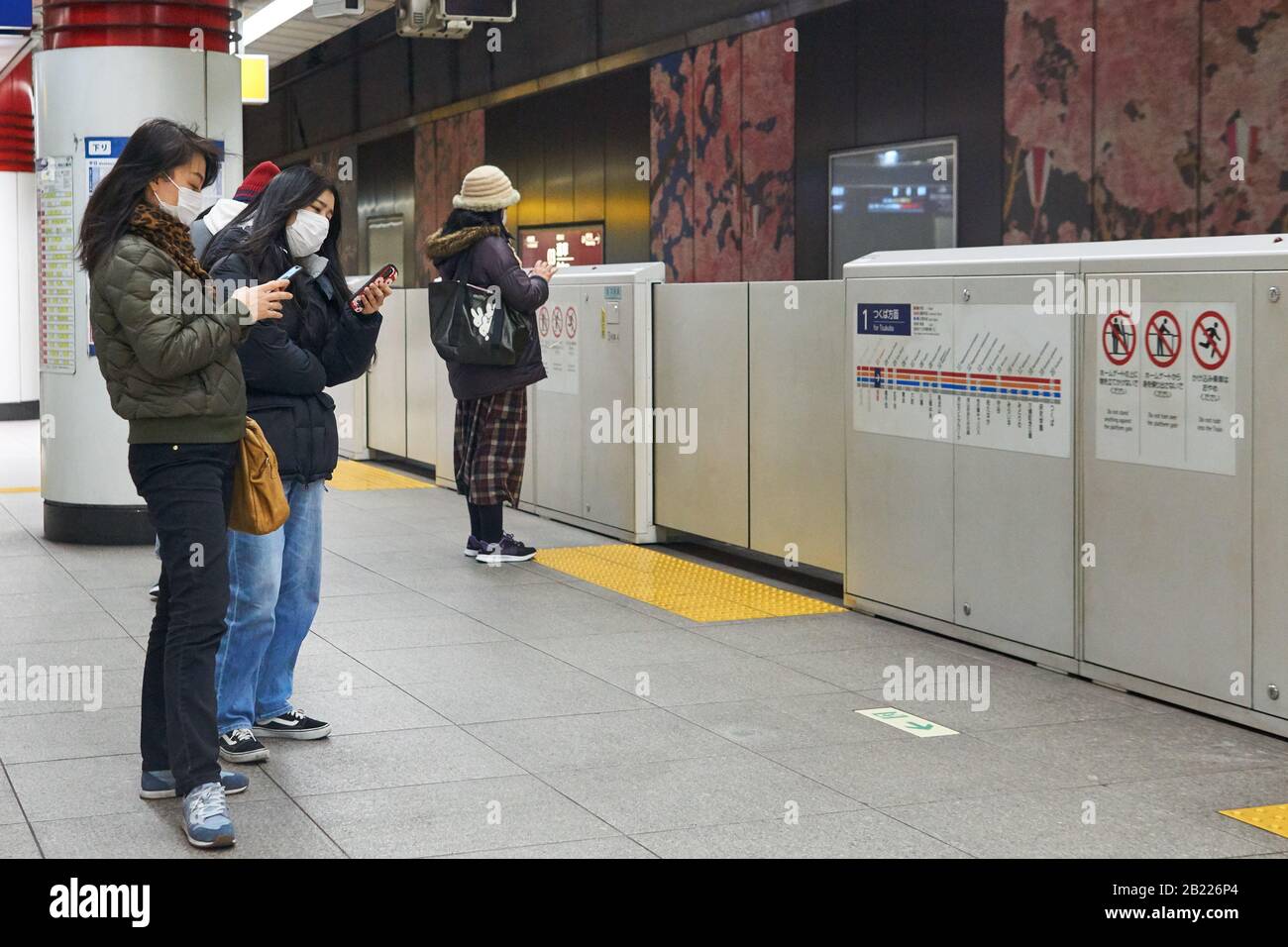 Japanese people wearing surgical masks to prevent infection by the
