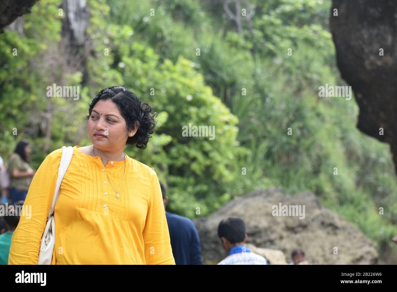 Indian lady in a park hi-res stock photography and images - Alamy