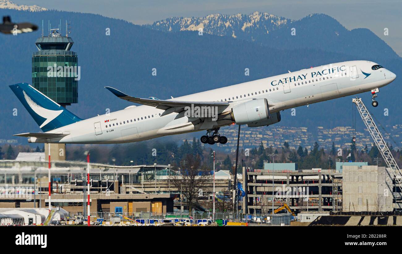 Richmond, British Columbia, Canada. 21st Feb, 2020. A Cathay Pacific Airways Airbus A350-900 XWB (B-LRM) extra wide-body jet takes off from Vancouver International Airport, Richmond, B.C. on Friday, February 21, 2020. Credit: Bayne Stanley/ZUMA Wire/Alamy Live News Stock Photo