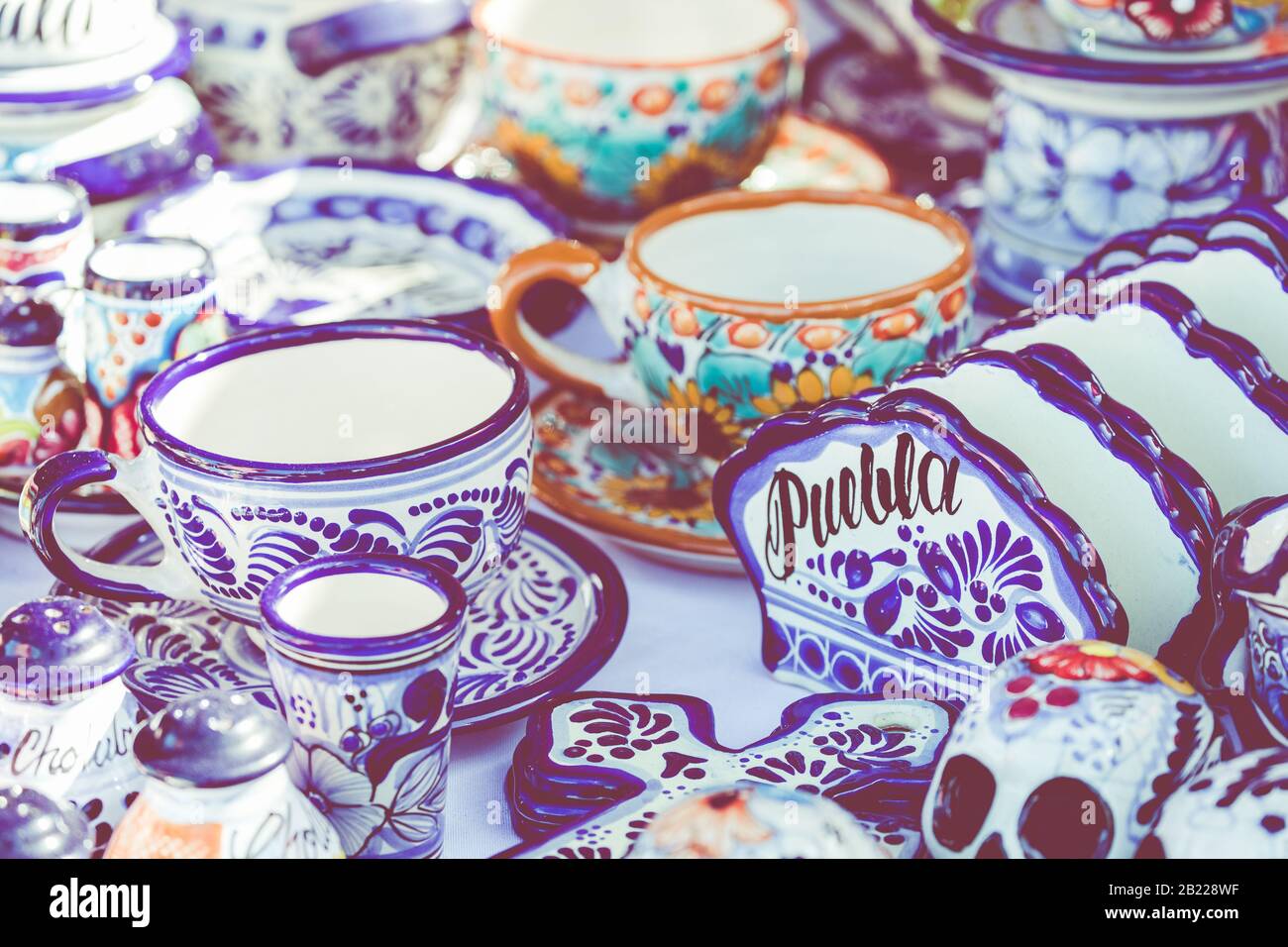 Colorful traditional Mexican pottery. Talavera style. Souvenirs on sale