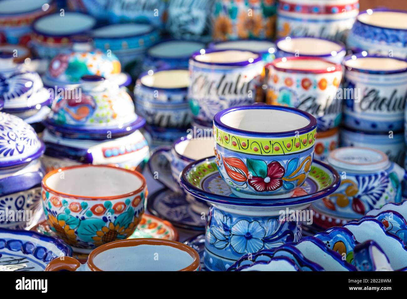 Colorful traditional Mexican pottery. Talavera style. Souvenirs on sale