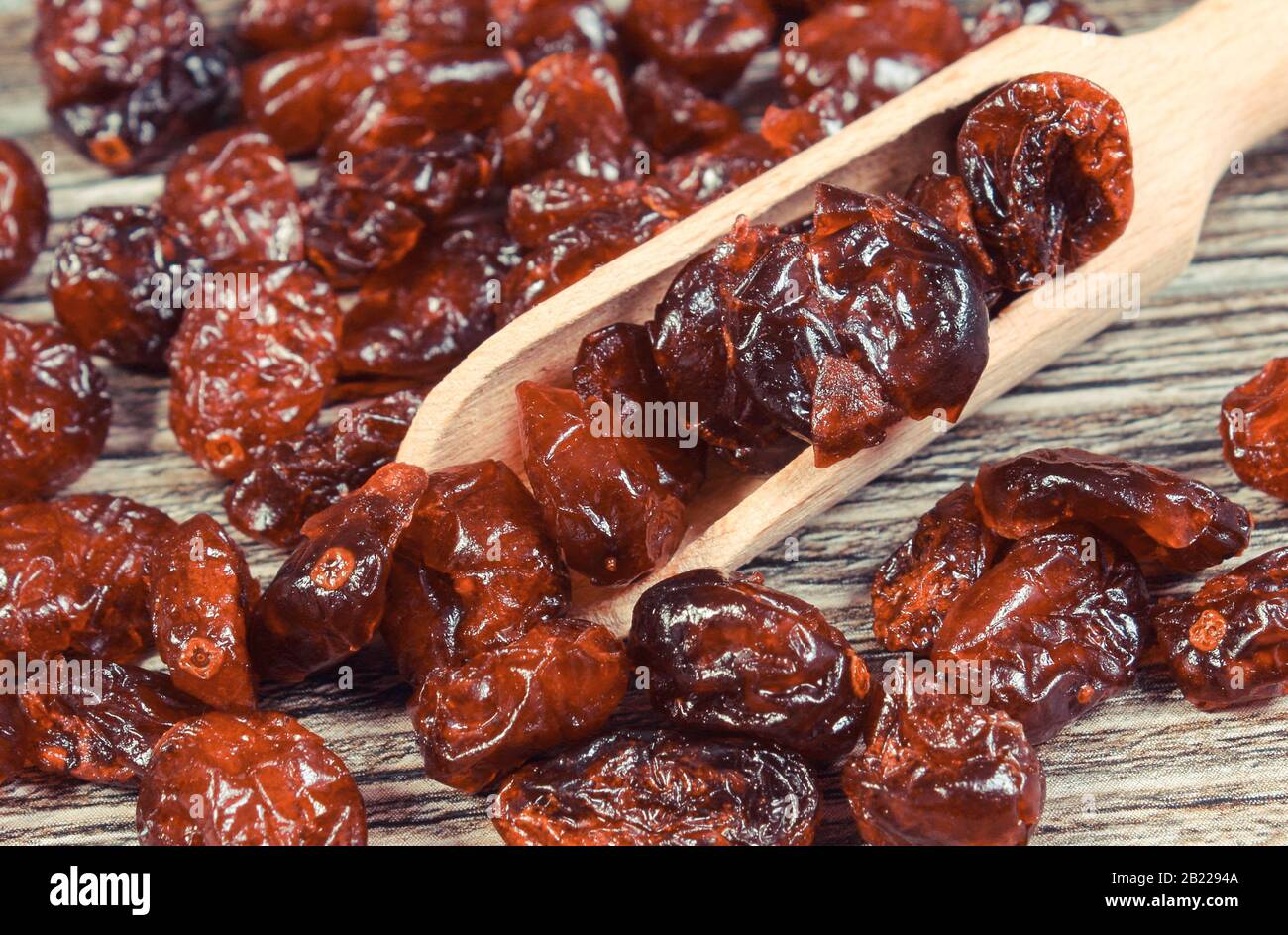 Cranberries with spoon as source natural minerals and dietary fiber