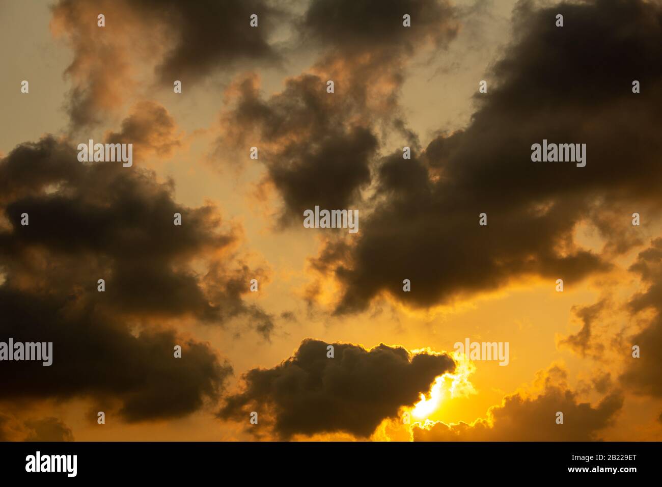 Dark clouds at sunset hi-res stock photography and images - Alamy