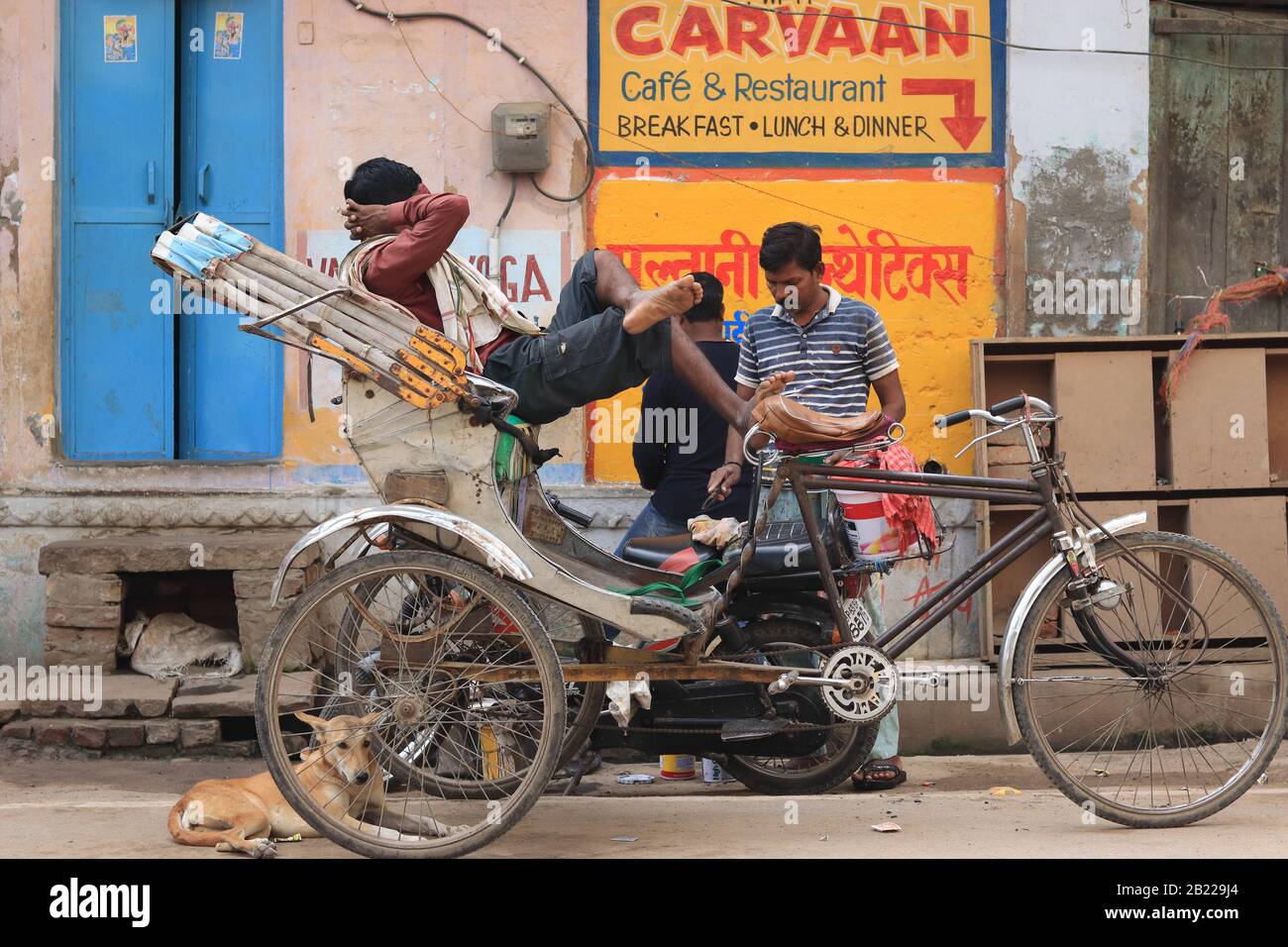 Indian man on the rickshaw Stock Photo