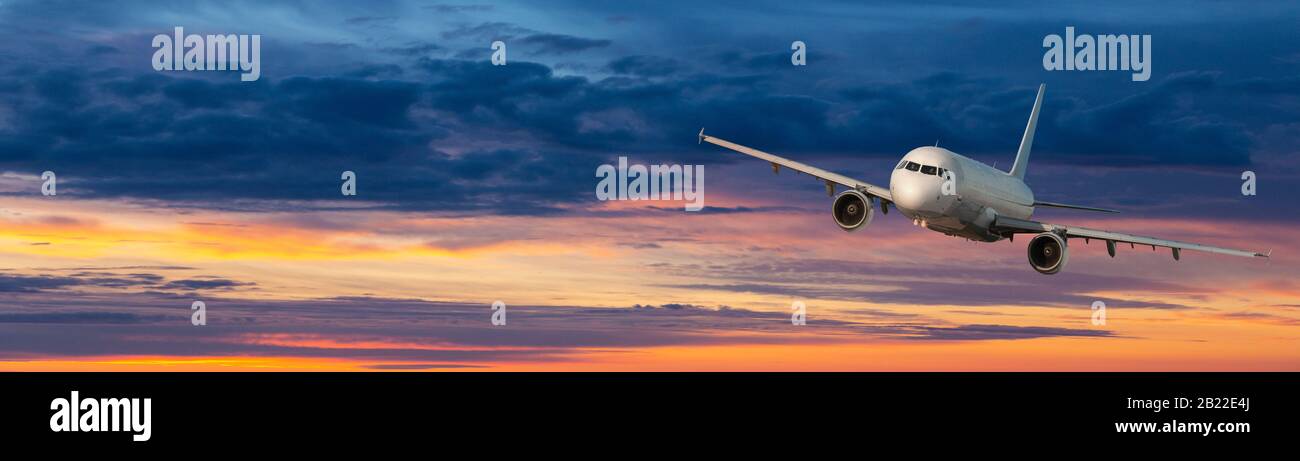 Airplane. Landscape with big white passenger airplane is flying in the ...