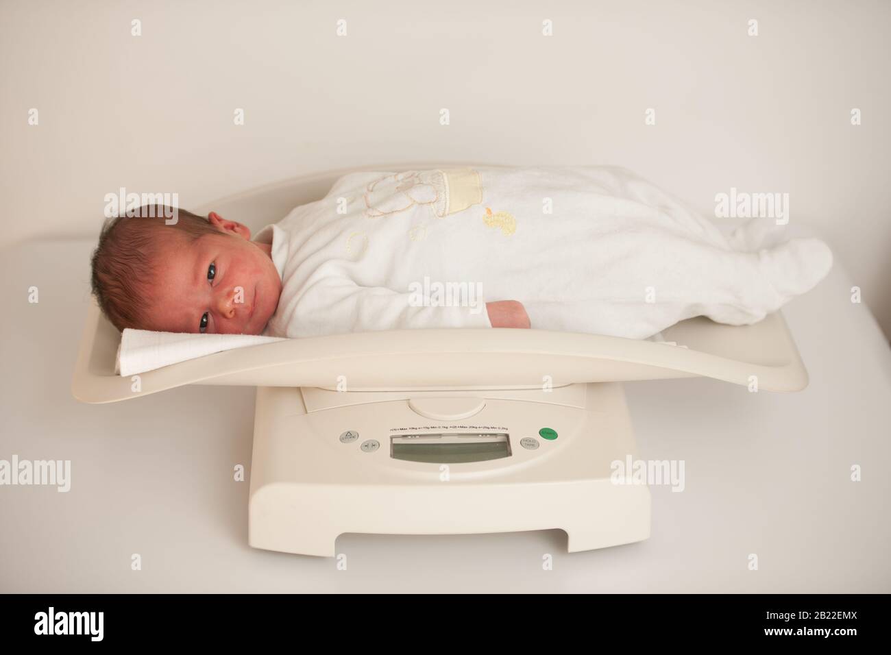 Digital Baby Scales On White Background Stock Photo 672390712