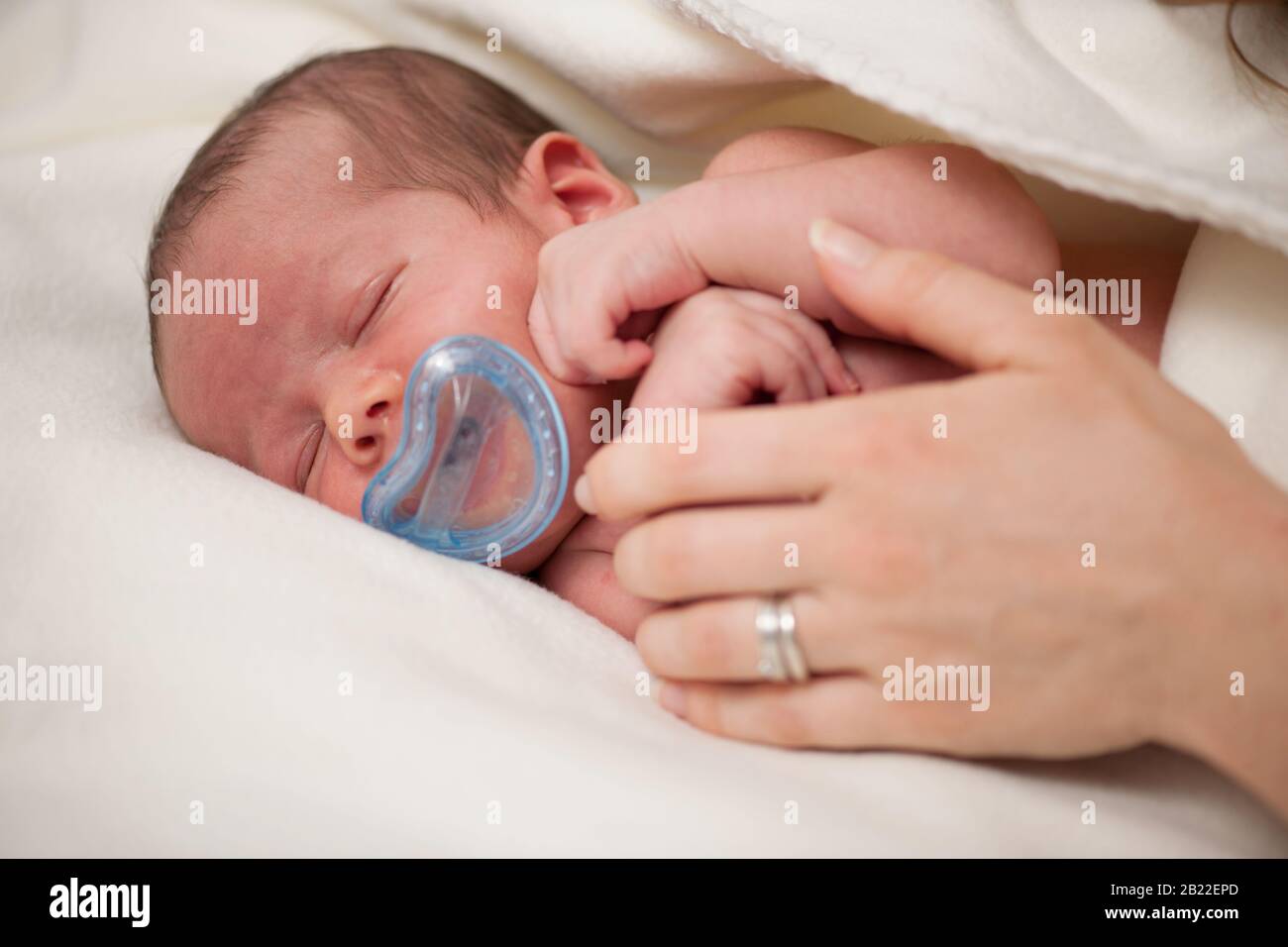 Baby boy sleep with soother in mouth Stock Photo Alamy