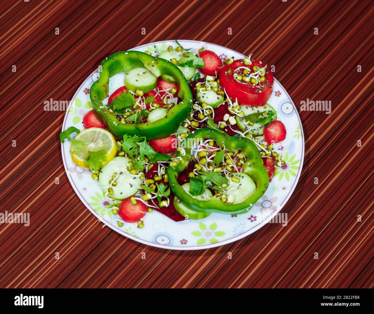 HEALTHY SALAD IN SERVING PLATE INVITES YOU FOR HEALTHY LIFE STYLE Stock Photo