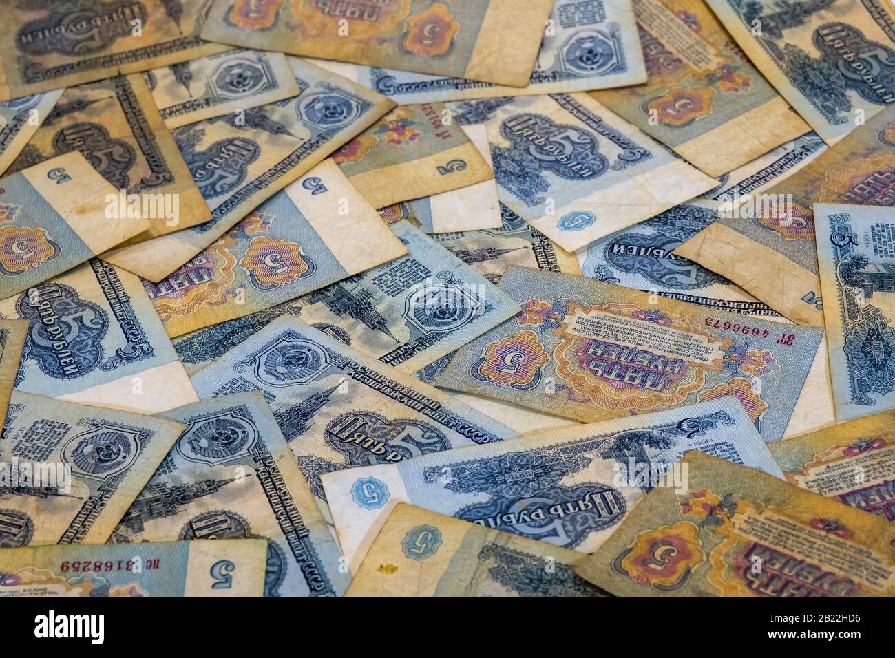 Background of five ruble denominations of Soviet money of the 1961 sample, shot in close-up. Stock Photo